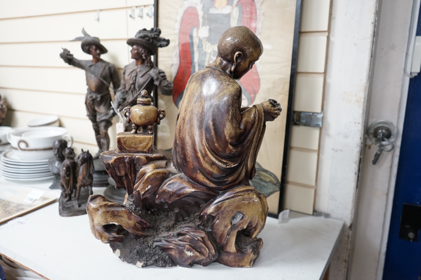 A large Chinese soapstone figure of a Luohan, 48cm